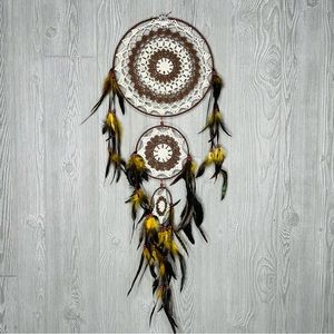 Brown and tan wall decoration art crochet dream catcher w/ feather / bead detail